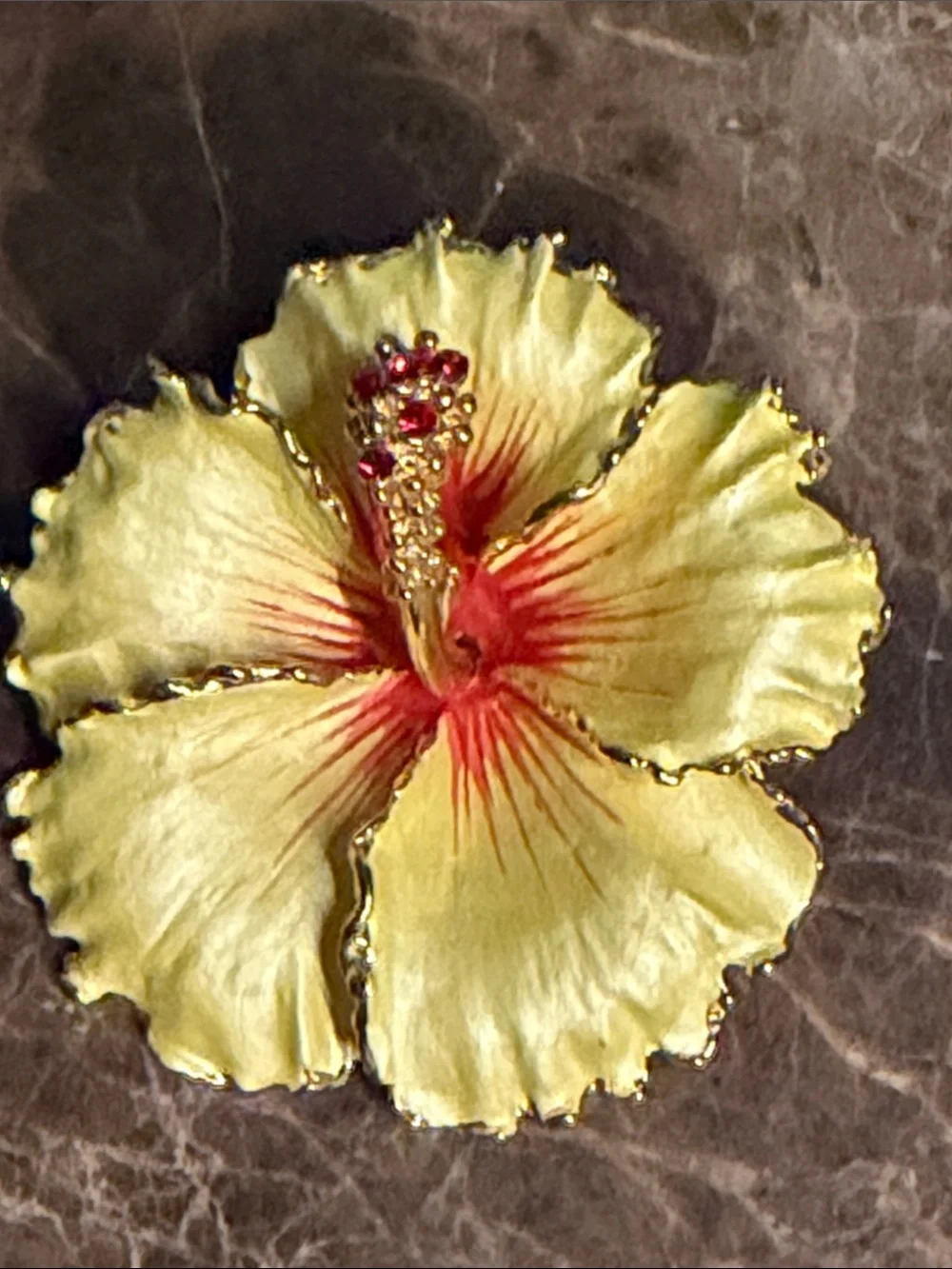 Gorgeous yellow hibiscus red crystal stand can be used as a pendant or brooch
